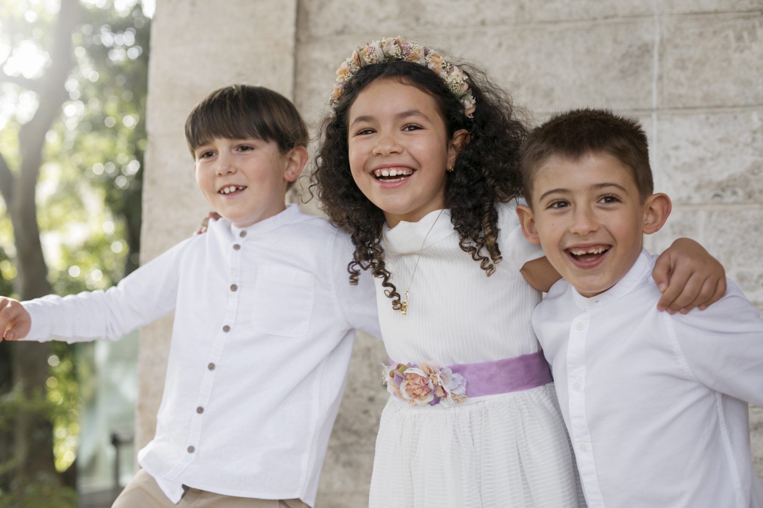 Children smiling before first communion