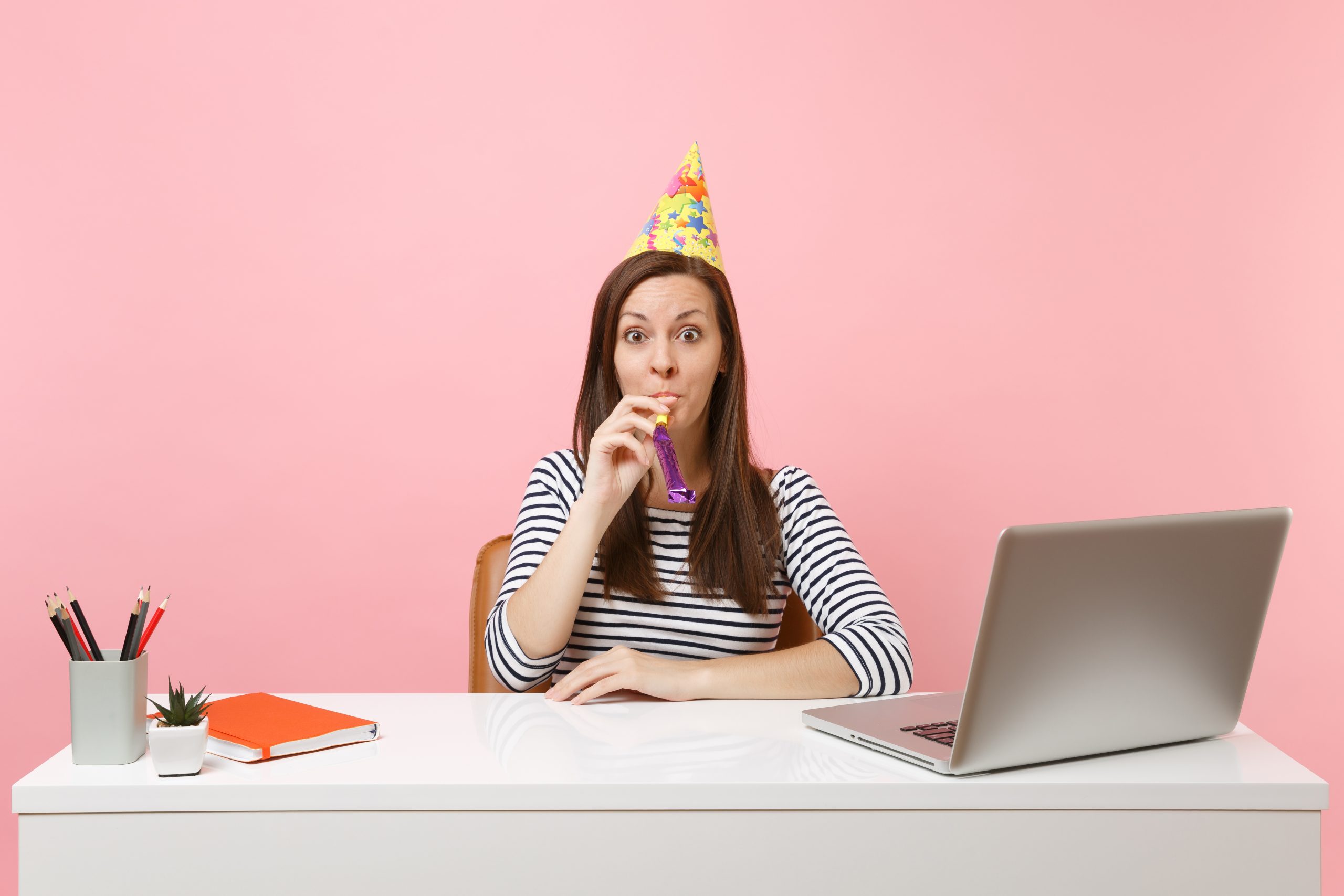 office female thining about birthday wishes for coworker