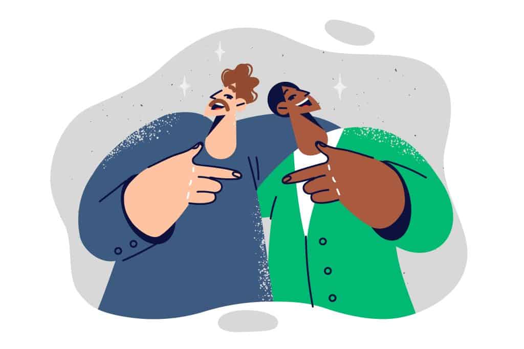 100 Hilarious Jokes of the Week for Work 1 Men friends hug and point at buddy, rejoicing at long-awaited meeting and opportunity to communicate. Friends from university laughing to demonstrate lack of racial prejudice and discrimination. Coworkers laughing together about jokes of the week for work.